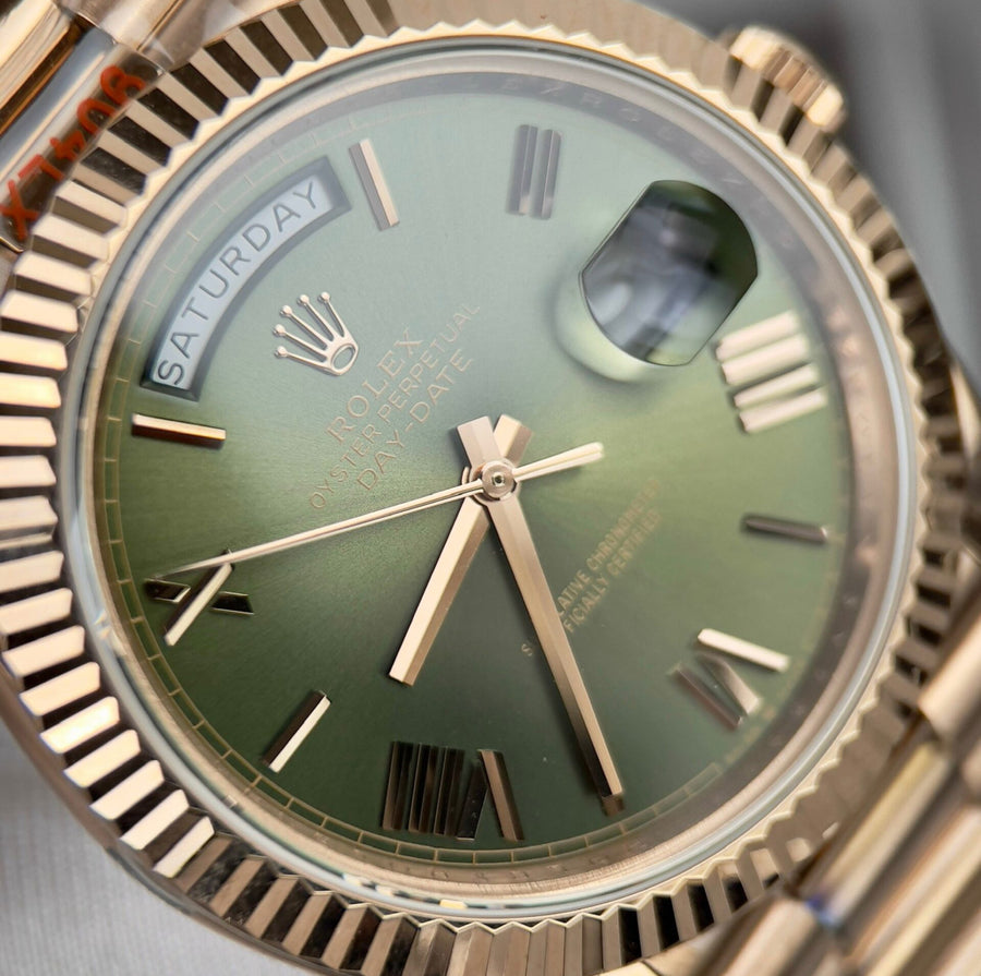 Day-Date golf rose/green dial